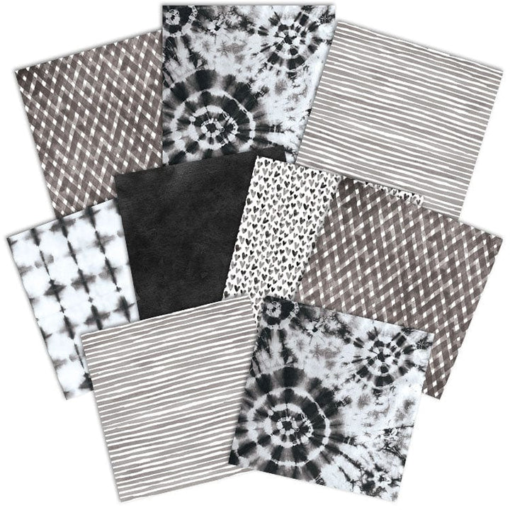 PSET-0018E - Black Colorways Pattern 12 x 12 Scrapbook Paper Set - Twelve black and white patterned papers arranged in a display, featuring tie-dye, stripes, checkered, and geometric designs