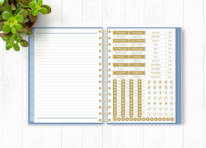 Wild and Free planner organizer image shown open to an inside spread featuring a lined page and a sticker sheet.