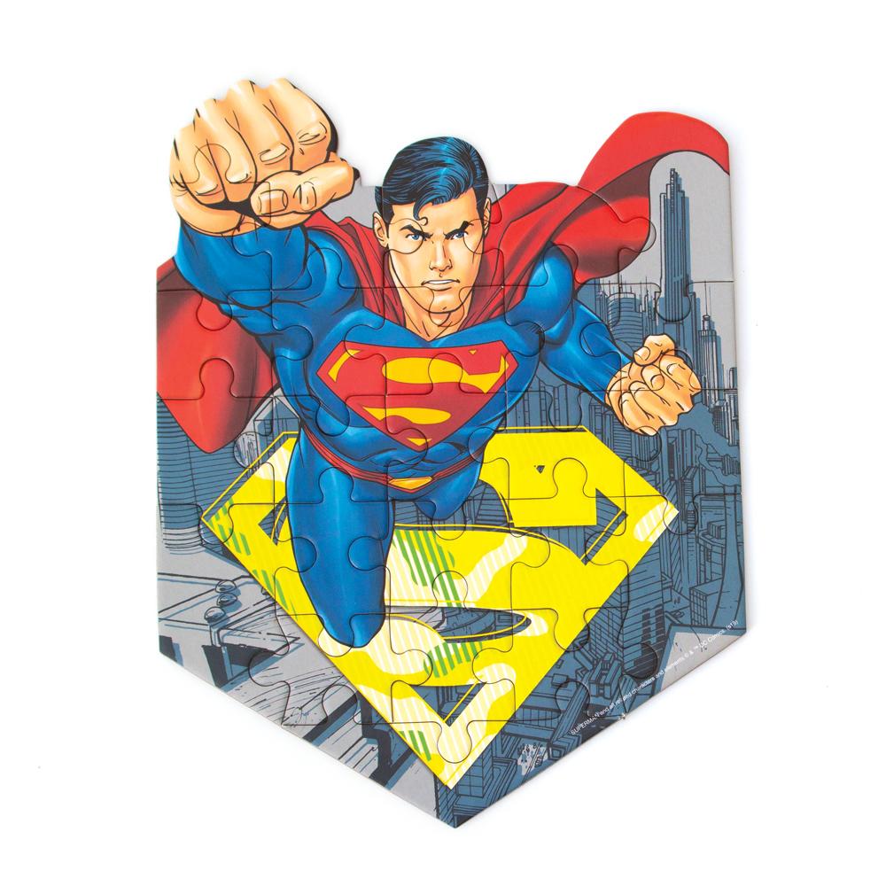 mini die cut jigsaw puzzle featuring superman, shown on white background.